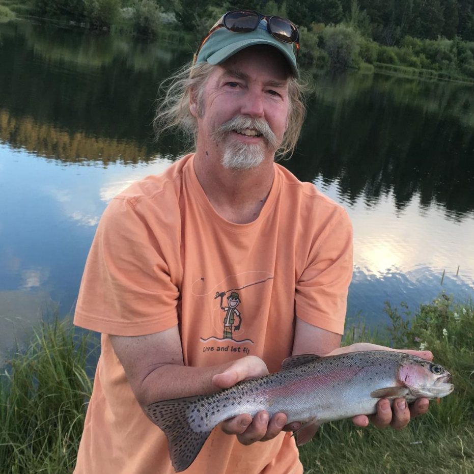 John Wallace holding a fish.